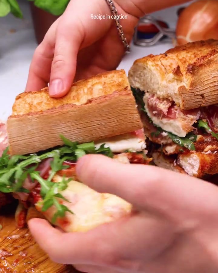 Chicken parm sandwich cut in half, a still from my reel for HexClad